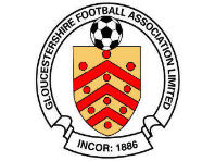 Gloucestershire FA referee badge: red and gold shield with a football, dated 1886