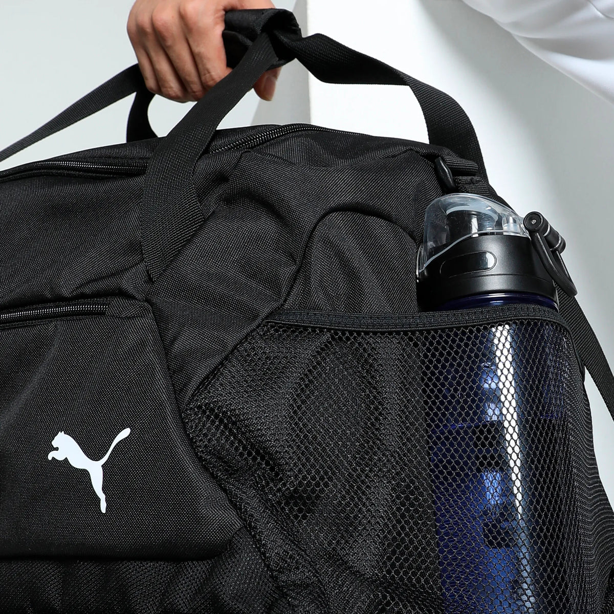 Close-up of the side bottle pocket on the Puma hard case referee bag
