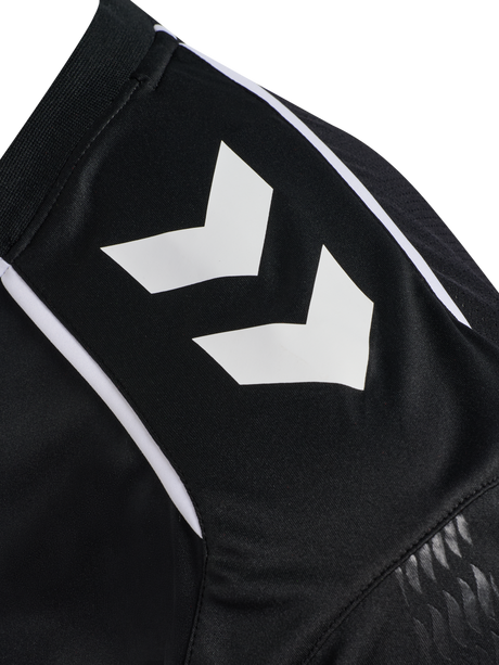Close-up of the Hummel chevron sleeve detail on the black Hummel 2026 referee shirt