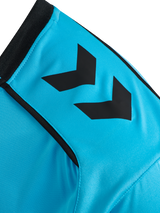 Close-up of the Hummel chevron sleeve detail on the blue Hummel 2026 referee shirt