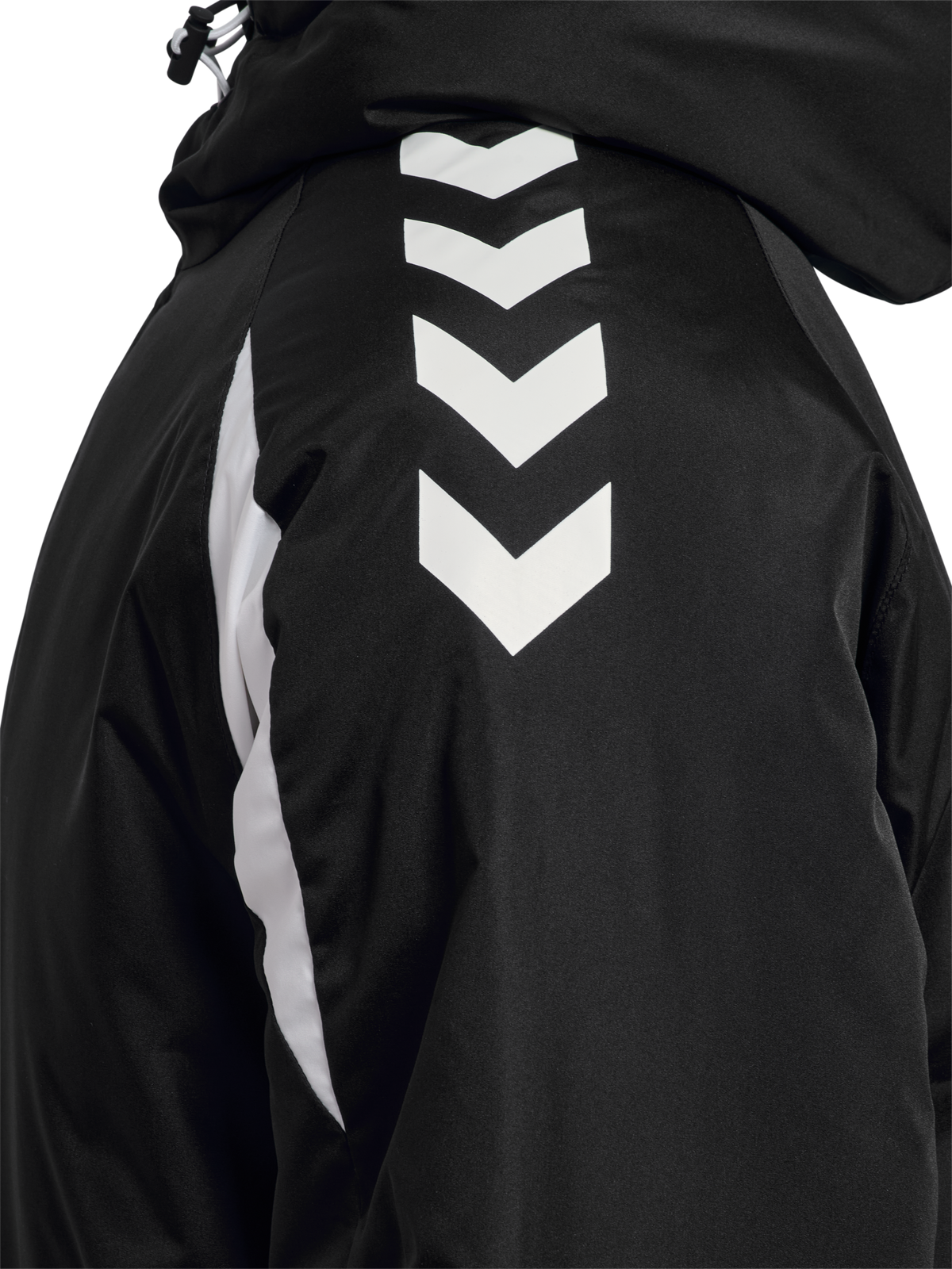 Close-up of the white chevrons on the sleeve of the black Hummel referee winter coat