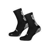 Pair of Precision black grip socks with patterned grip panels
