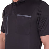 Referee wearing the A&H black referee shirt, close-up of the chest pockets