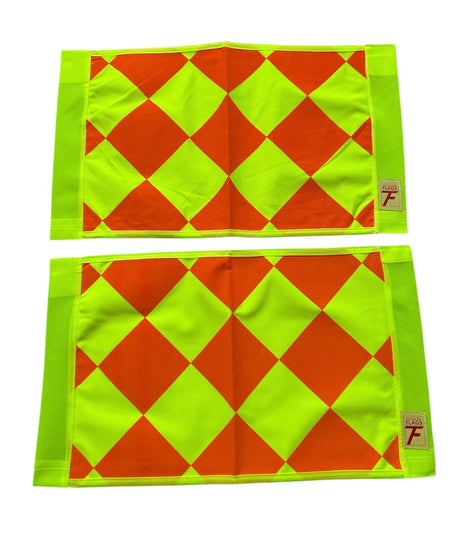 Touchline Diamond flag cloths laid flat, showing the red and yellow diamond pattern