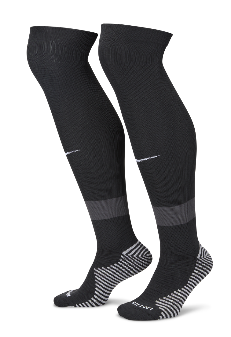 Pair of black Nike referee socks with grey heel and toe, side view