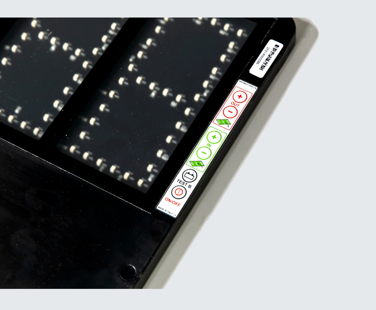 Close-up of the LED panel and control buttons on the substitution board