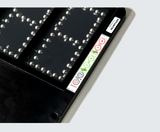 Close-up of the LED panel and control buttons on the substitution board