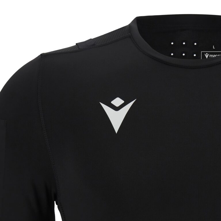 Close-up of the Macron logo on the black Macron UEFA referee base layer