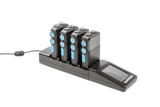 A black Vokkero multi-device charging dock with four charging slots holding black devices with blue circular accents, shown on a white background with a power cable extending from the left.