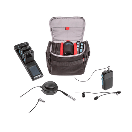A multi-piece audio recording kit displayed on a clean white background, featuring a black and gray carrying bag with its contents organized inside, a black multi-channel recorder, a black wireless transmitter, a black lapel mic, and other accessories.