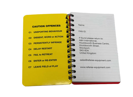A&H referee notebook open, showing the yellow cautions reference page