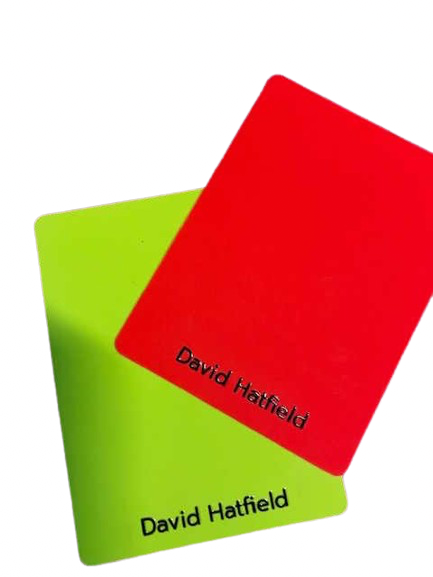 Custom printed red and yellow referee cards personalised with a referee's name