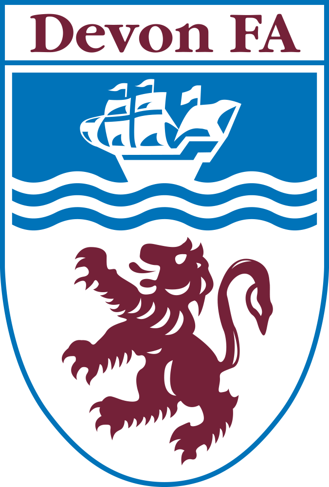 Devon FA referee badge: shield with a ship over waves and a red lion
