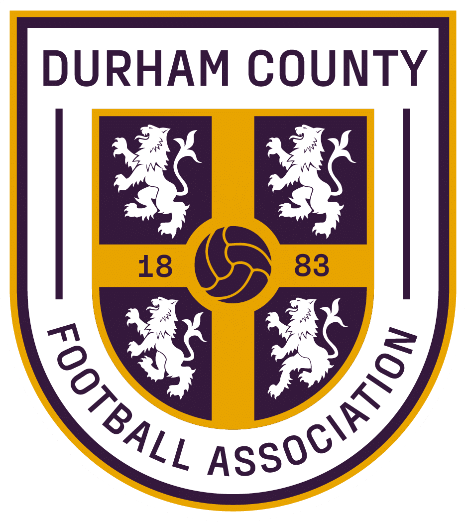 Durham County FA referee badge: purple and gold shield with four lions and a football, dated 1883