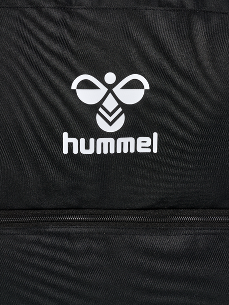Close-up of the white Hummel logo on the black Hummel referee bag