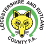 Leicestershire and Rutland County FA referee badge: yellow fox head in a green circle