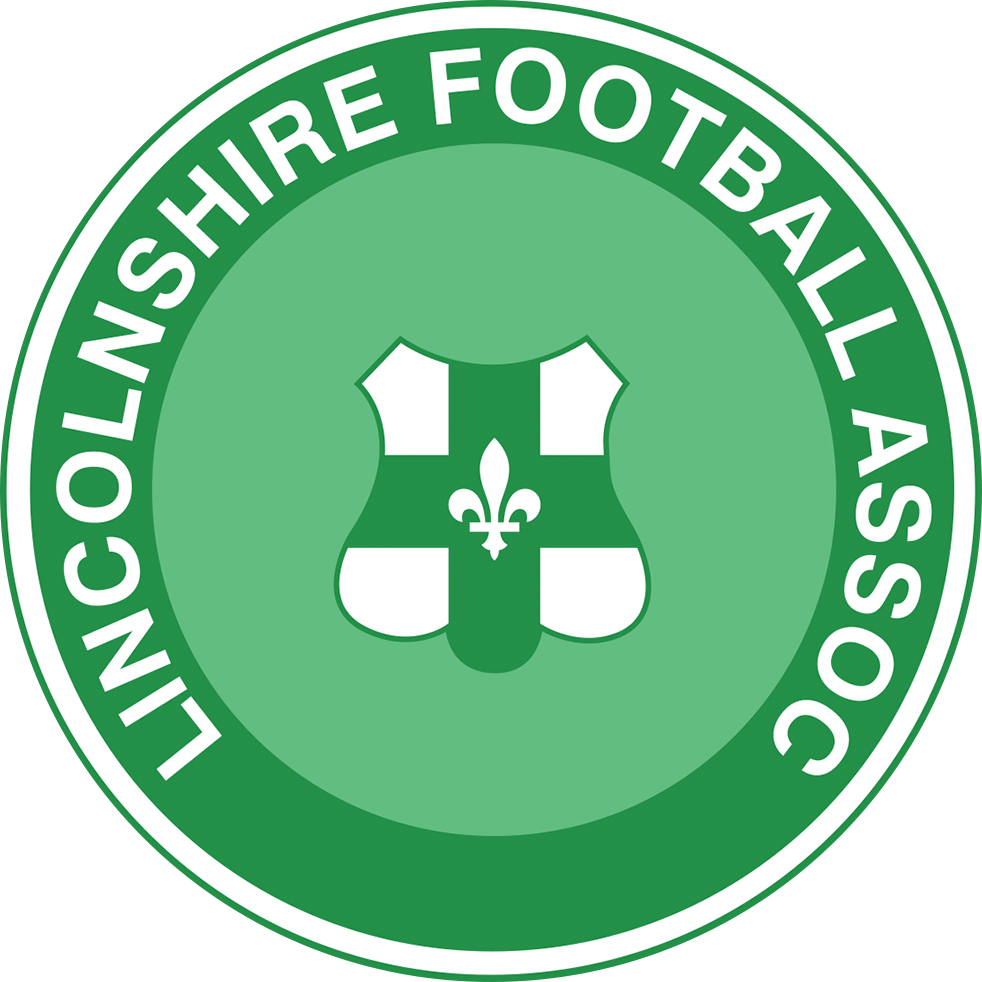 Lincolnshire FA referee badge: green circle with a white shield and fleur-de-lis