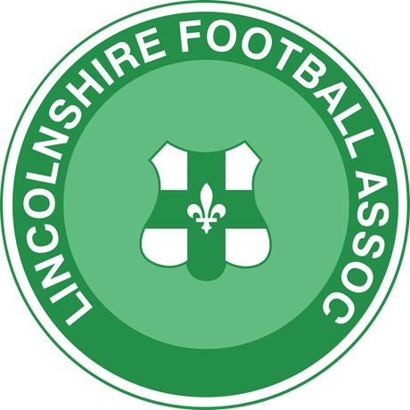 Lincolnshire FA referee badge: green circle with a white shield and fleur-de-lis