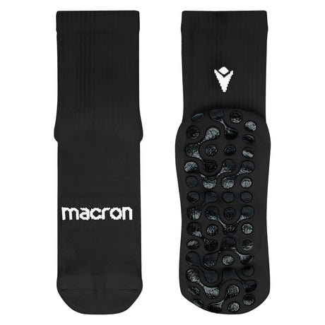 Macron black grip socks showing the rubber grip sole