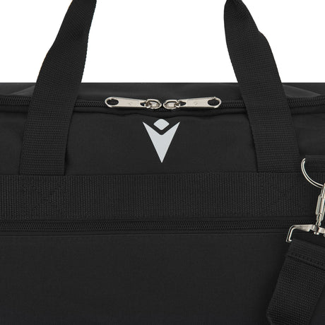 Close-up of the Macron logo and zip on the black Macron referee bag