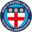 North Riding County FA referee badge: blue circle with a red cross shield and three roses