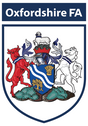 Oxfordshire FA referee badge: shield with an ox crossing water, supported by an elephant and a beaver