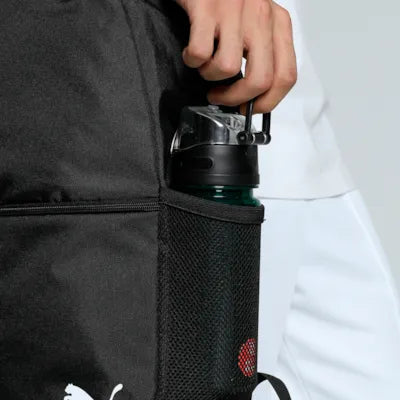 Close-up of the side bottle pocket on the Puma black backpack