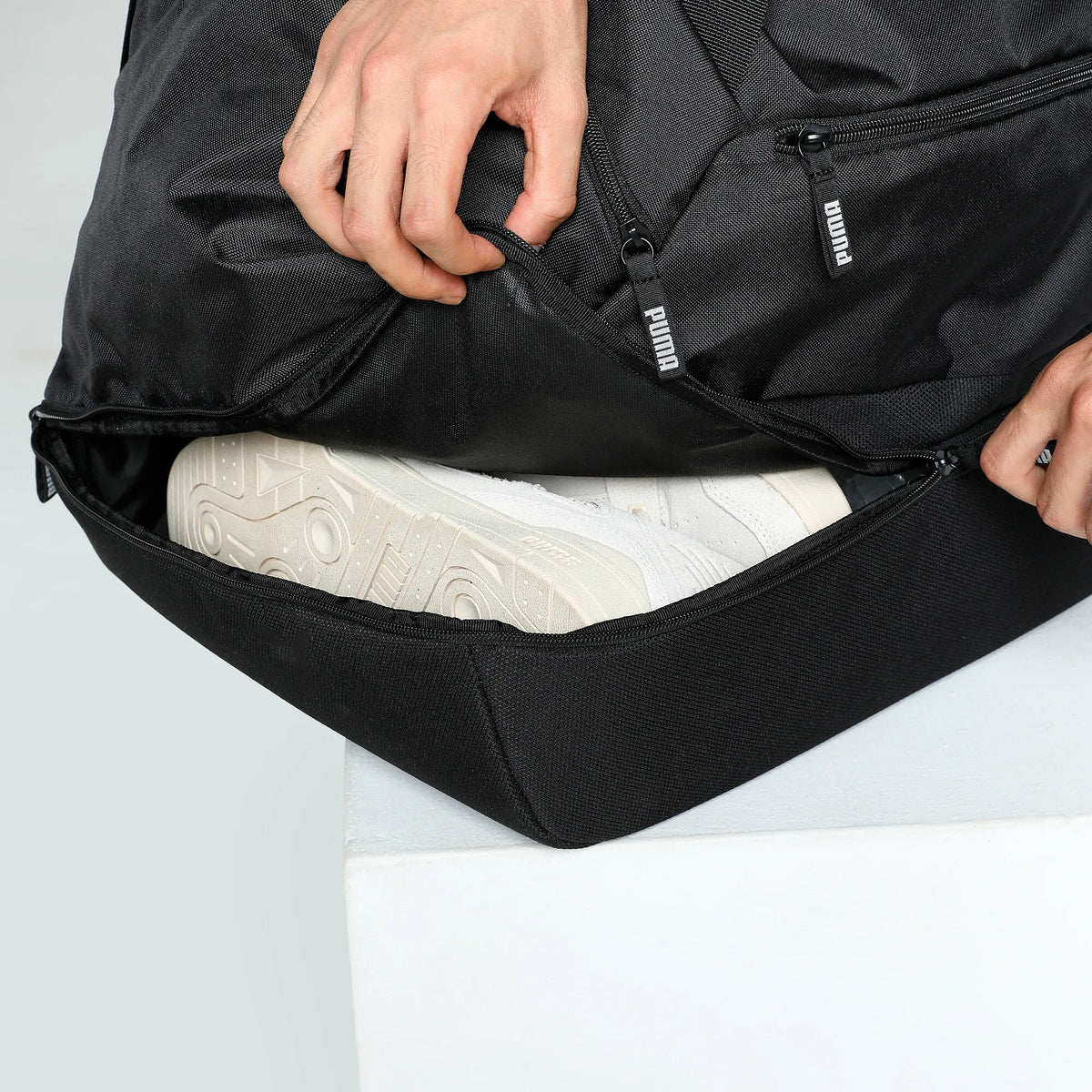 Puma hard case referee bag, close-up of the padded base compartment