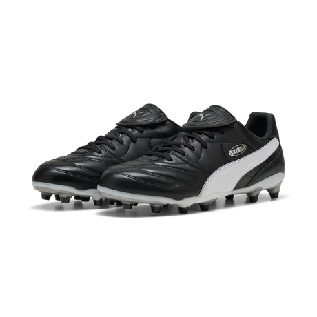 Pair of Puma Liga black leather football boots with white Puma stripe